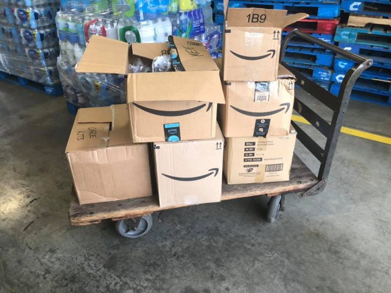 A cart full of personal care kits we assembled and gave away to the local Food Bank during the tornadoes in Dayton