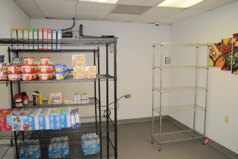 This is an image of our first food pantry.  No fridge, no freezer, but someone had made a donation and it started from there.